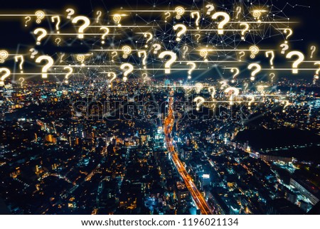 Qustion Marks with aerial view of Tokyo, Japan at night