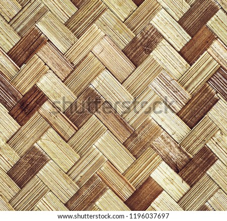 Pattern of bark basket. style braided pattern. neutral beige woven texture image for background. endless seamless background fill.