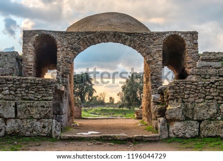 Arch at Paestum Greek Roman Ruins in Cilento Italy Royalty-Free Stock Photo #1196044729
