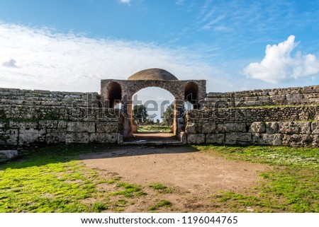Arch at Paestum Greek Roman Ruins in Cilento Italy Royalty-Free Stock Photo #1196044765