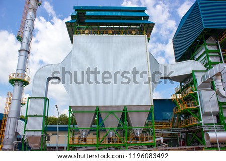 Electrostatic precipitator for remove dust in flue gas from boiler at biomass power plant. Royalty-Free Stock Photo #1196083492