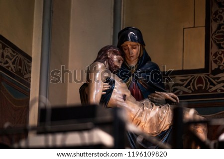 Picture of mother Mary holding a dead body of Jesus Christ statue