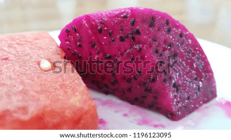 sliced of  red Dragon fruit and water melon