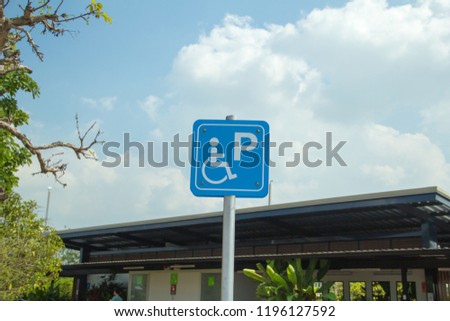 Parking (limited spaces),Accessible parking,Close-up of a dirty parking sign