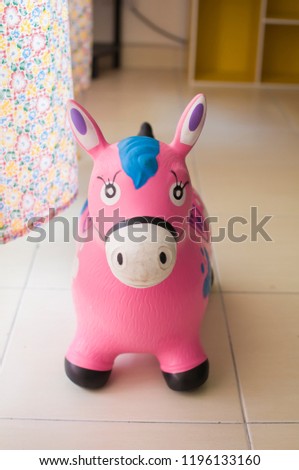 Kids pink horse at home