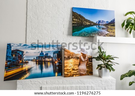 interior in gray green tones with pictures on a white wall