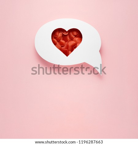Creative valentines concept photo of comic cloud with hearts on pink background.