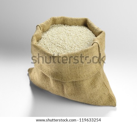 rice inside a jute bag vintage open with ladle and placed on the floor Royalty-Free Stock Photo #119633254