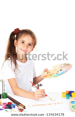 Cute little girl painting a picture, isolated on white