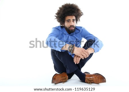 Funky Afro man sitting