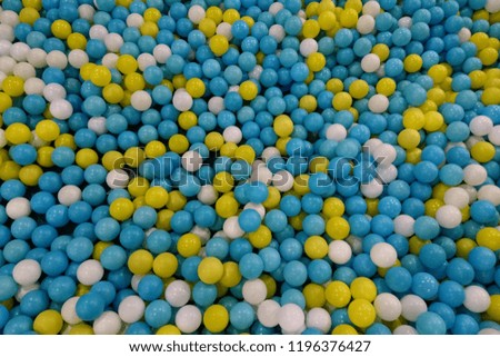 Ball pit for kids blue, yellow and white. 