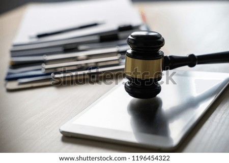 Judge and documents on office desk Legislation