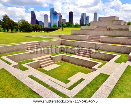 Beautiful View of Buffalo Bayou Park and Downtown Houston (Skyline / Skyscrapers) on a Summer Day, with Marble Memorial/ Monument in Foreground - Houston, Texas, USA 