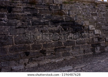 Europe, Italy, Bellagio, Lake Como, a stone building that has a sign on a brick wall