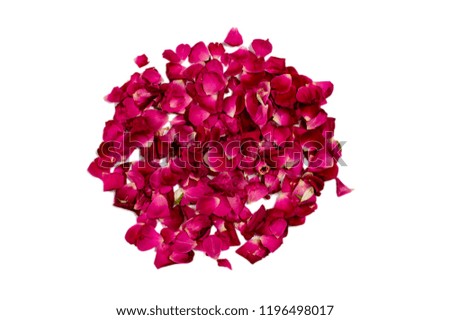 Heap and circle of red rose petals on white surface