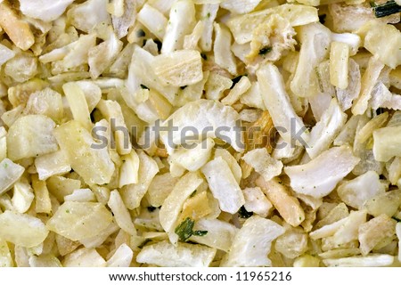 Closeup of an onion flakes background