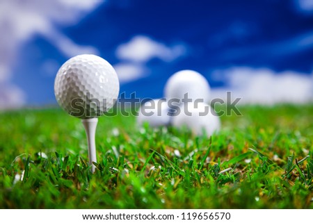 Golf ball on the green grass. Studio Shot!