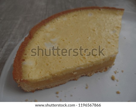 A large slice of lemon tart