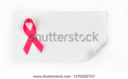 Close up of Pink color ribbon isolated with paper curl Mockup on white background. Top view. Flat lay design.