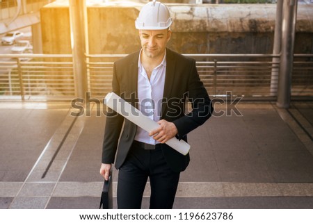 Design Architect in formal suit walking up on stairs,Hurry to work on street