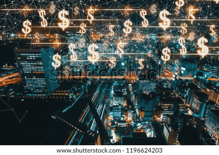 Dollars with aerial view of Tokyo, Japan at night
