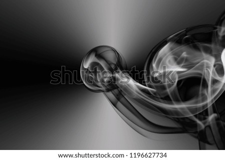 Abstract eerie smoke trails and shapes on black background. Various designs ghostly and alien styles