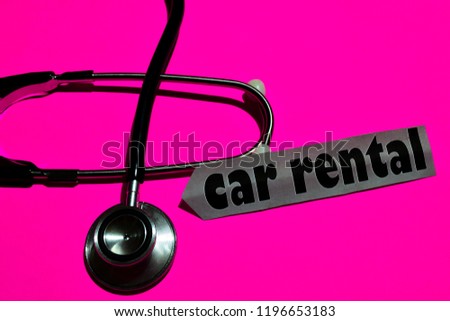 Car rental plan on the paper with healthcare concept Inspiration. stethoscope on pink bakcground 