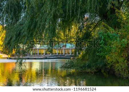View of a boathouse beyond one of the ponds in New York City's Central Park.