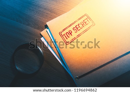 Private investigator desk with top secret envelopes Royalty-Free Stock Photo #1196694862