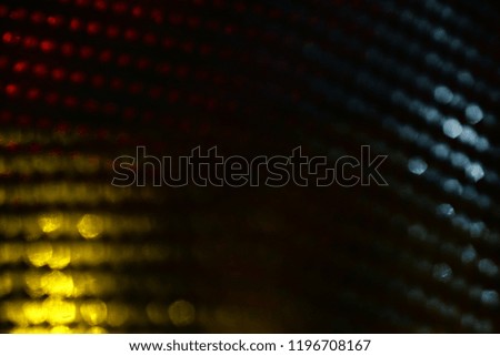 glitter vintage lights background. black, blue and gold. de-focused