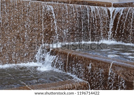 Cascading water in a public fountain