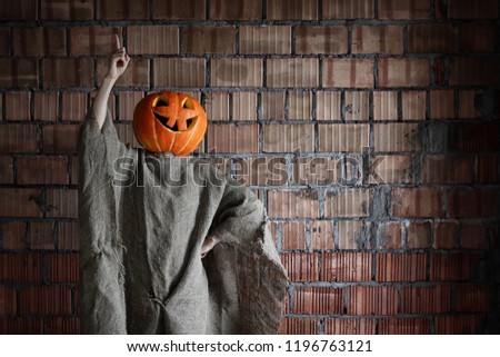 pumpkin head monster sign hand space halloween