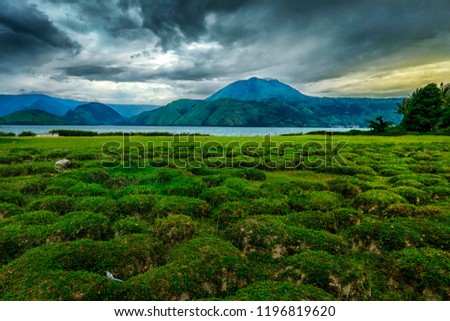 a panorama of Lake Toba , one of the biggest lake in the world  Royalty-Free Stock Photo #1196819620