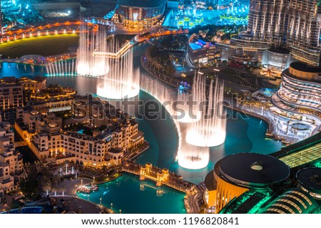Dancing fountain show. Magical view at night. Tourist attraction. Luxury travel inspiration.  Royalty-Free Stock Photo #1196820841