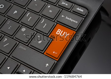 Buy Return Key symbolizing the closing of an ecommerce deal by someone shopping online or on the internet also known as the worldwide web