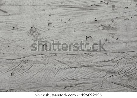 Vintage or aged grungy background empty space of natural concrete cement, plaster or stone, old texture as a retro pattern wall. Abstract blank wide raw & bare wall for design ideas, text, pictures.