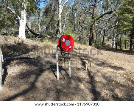 Bushfire prevention hose wheel