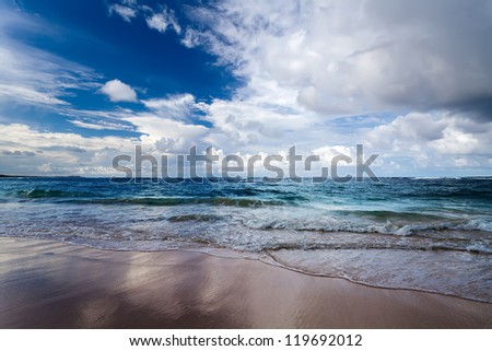 Tropical beach with blue sky.