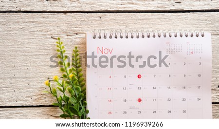 November 2018 calendar on white wooden background. Winter time and mood
