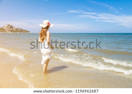 Portrait of beautiful young asian woman summer vacation on beach,Cute teenage girl at sea
