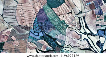 composition, allegory, tribute to Picasso, abstract photography of the Spain fields from the air, aerial view, representation of human labor camps, abstract, cubism, abstract naturalism, Royalty-Free Stock Photo #1196977129