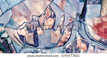 the footprint of the human being, tribute to Picasso, abstract photography of the Spain fields from the air, aerial view, representation of human labor camps, abstract, cubism, abstract naturalism,