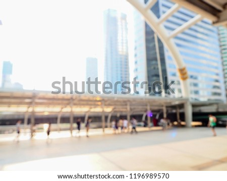 Bottom up view and blurred of buildings in Thailand and people. Economy, finances, business activity concept. 