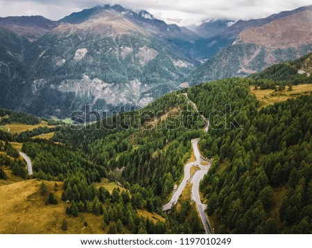 Curves of alpine Grossglockner road going through the Grossglockner mountains in Austria. Curvy serpentine road through Austrian Alps mountains.