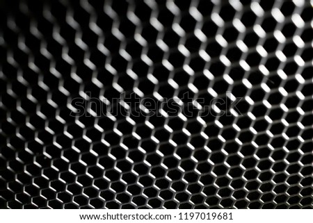Abstract black metallic wallpaper. spotlight on black metallic mesh background.