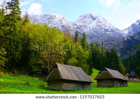 Wooden Huts underneath Giewont Mountain at Polana Strazyska near Zakopane