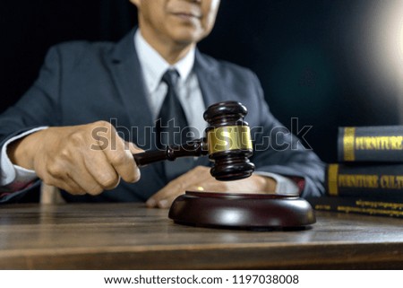 Judge lawyer gavel work in office with  balance  in law firm concept 