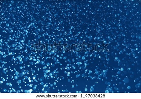 abstract blue bokeh glitter sparkle background. background for template web advertising design brand, backdrop, party, new year christmas celebration etc.