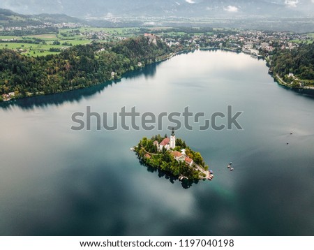 Island of lake Bled with Pilgrimage Church of the Assumption of Maria in city of Bled in Slovenia.