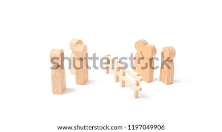 Negotiations of businessmen. A wooden fence divides the two groups discussing the case. Termination and breakdown of relations, breaking ties. Contract break, conflict of interests.